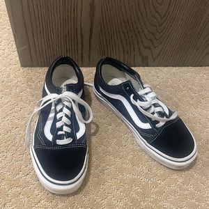 Black Vans sneakers